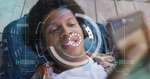 Image of data processing over african american man using smartphone Stock Photos