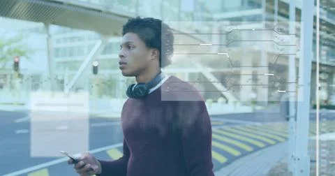 Image of data processing over african american man using smartphone Stock Photos