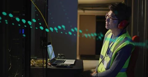 Image of data processing over african american man using laptop Stock Photos