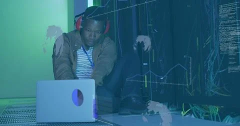 Image of data processing over african american it man by computer servers 写真素材