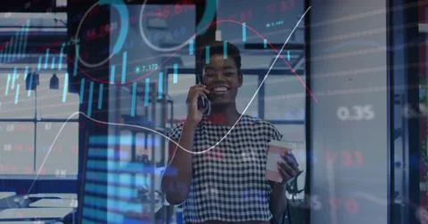 Image of data processing over african american businesswoman using smartphone in 스톡 사진