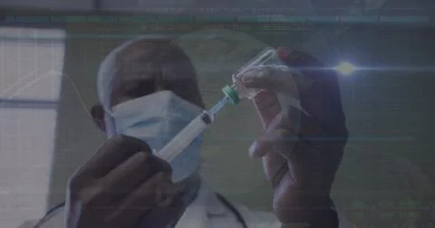 Image of data processing over african american male doctor with face mask with Foto stock