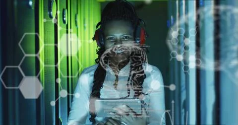 Image of data processing over african american female worker in server room 写真素材
