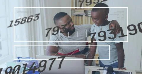 Image of data processing over african american man with his son using laptop Stock Photos