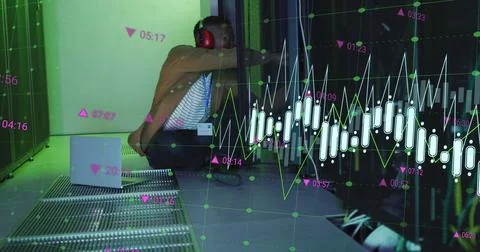 Image of data processing over african american man using laptop in server room Stock Photos