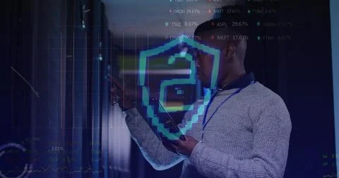 Image of data processing over african american man using tablet in server room Stock Photos