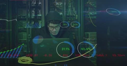 Image of data processing over asian male hacker in hoodie with laptop by Foto stock