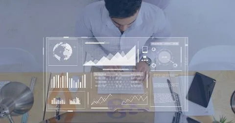 Image of data processing over asian businessman in office using computer Stock Photos