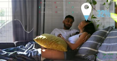 Image of data processing over biracial couple talking 스톡 사진