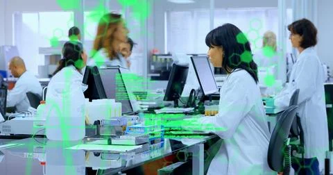 Image of data processing over biracial senior female scientist using computer at Foto stock