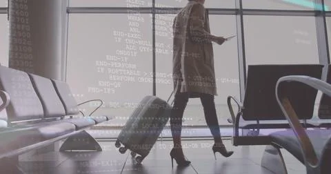 Image of data processing over businesswoman with tablet at airport Stock Photos