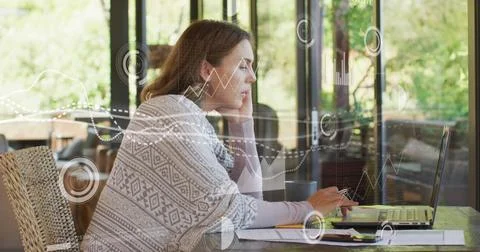 Image of data processing over caucasian pregnant woman using laptop Foto stock