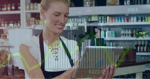Image of data processing over caucasian woman using tablet Foto stock