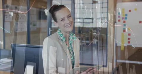 Image of data processing over caucasian woman using tablet Stock Photos