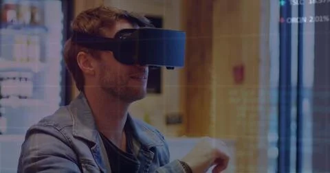 Image of data processing over caucasian man using vr headset 스톡 사진