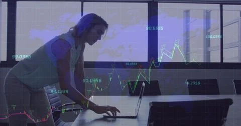 Image of data processing over caucasian businesswoman using laptop Foto stock