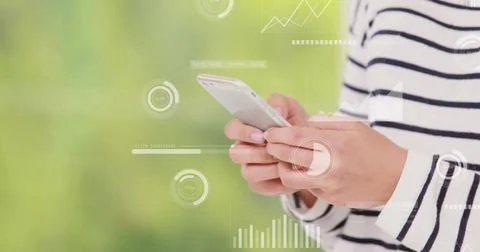 Image of data processing over caucasian woman using smartphone Stock Photos