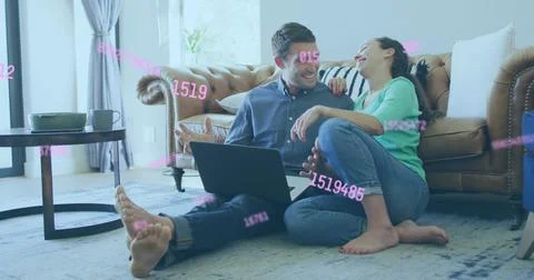 Image of data processing over caucasian couple using laptop Fotos Stock