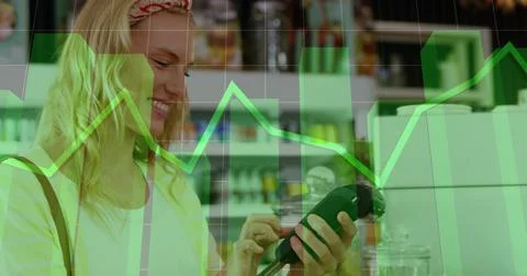 Image of data processing over caucasian woman paying with credit card 스톡 사진