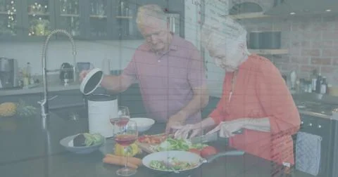 Image of data processing over caucasian senior couple cooking Fotos Stock