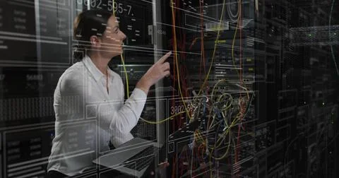 Image of data processing over caucasian female it technician with laptop over 스톡 사진