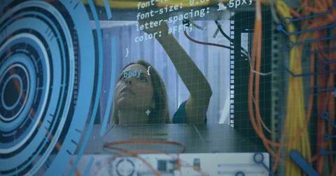 Image of data processing over caucasian woman inspecting server room 写真素材