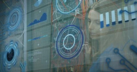 Image of data processing over caucasian woman inspecting server room Stockfoto's