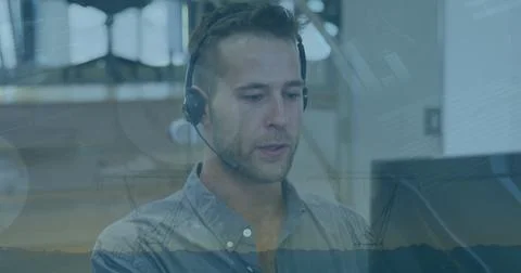 Image of data processing over caucasian businessman using phone headset in 写真素材