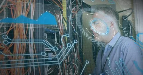 Image of data processing over caucasian server room worker Stockfoto's
