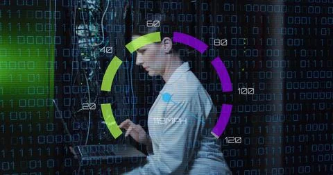 Image of data processing over caucasian woman using laptop server room Stockfoto's
