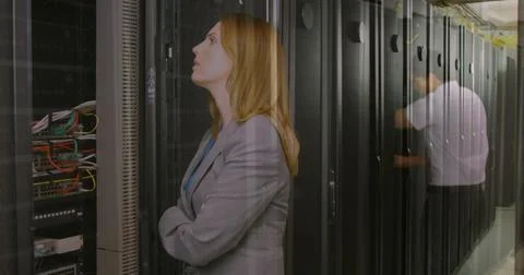 Image of data processing over caucasian woman in server room Stock Photos