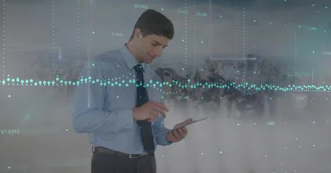 Image of data processing over caucasian businessman using tablet and cityscape Stock Photos