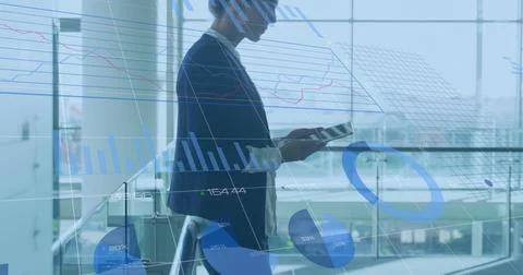 Image of data processing over caucasian businesswoman using tablet Stock Photos
