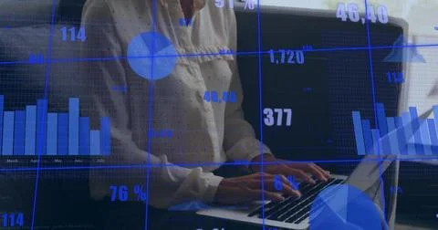 Image of data processing over caucasian businesswoman using laptop in office Stock Photos