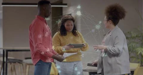 Image of data processing over diverse business people in office Foto stock