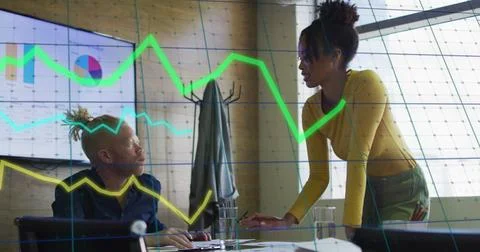 Image of data processing over diverse business people in office Foto stock