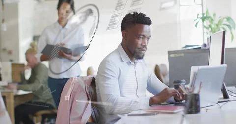 Image of data processing over diverse business people in office Foto stock