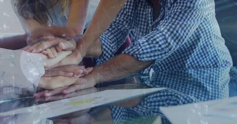 Image of data processing over diverse business people teaming up 写真素材