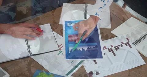 Image of data processing over diverse business people with documents Stock Photos