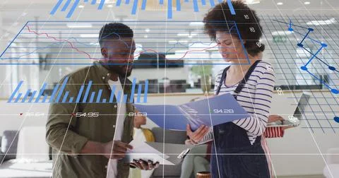 Image of data processing over diverse business people at office Foto stock