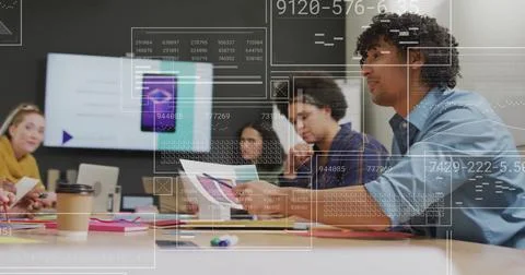 Image of data processing over diverse colleagues having meeting in office Stock Photos