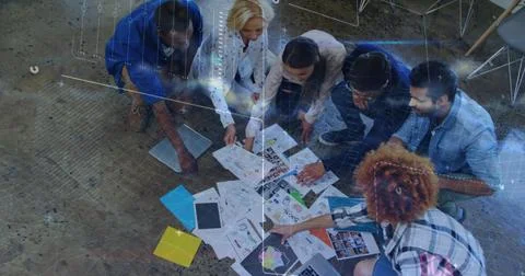 Image of data processing over diverse colleagues discussing over documents Stock Photos