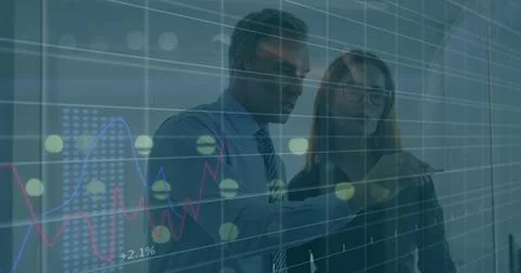 Image of data processing over diverse businessman and businesswoman discuss.. Foto stock