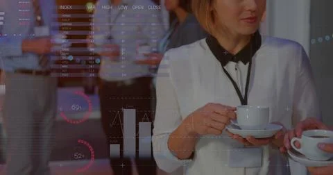 Image of data processing over diverse business people at office Foto stock