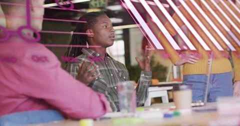 Image of data processing over diverse volunteers in warehouse Stock Photos