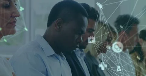 Image of data processing over diverse business people at meeting Foto stock