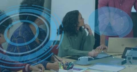 Image of data processing over diverse business people working in office Foto stock
