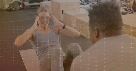 Image of data processing over diverse man and woman exercising in gym 写真素材