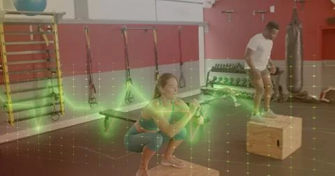Image of data processing over diverse man and woman exercising in gym 스톡 사진