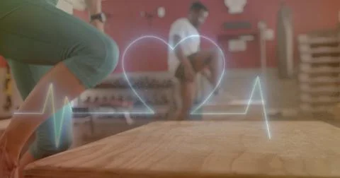 Image of data processing over diverse man and woman exercising in gym Stock Photos